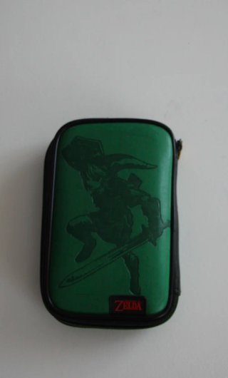 Nintendo 3DS blu con custodia e giochi