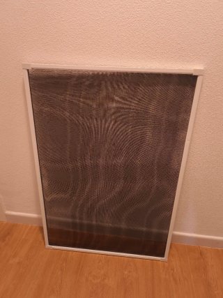 Mosquitera blanca para ventana