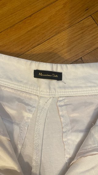 Pantalón palazzo beige con raya lateral