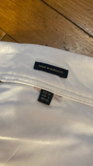 Pantalón palazzo beige con raya lateral