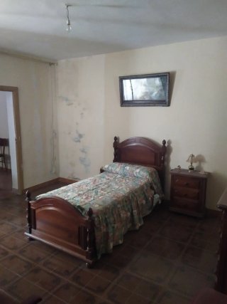Casa de tres plantas.