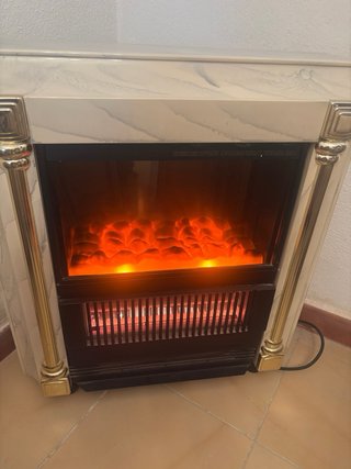 Estufa efecto chimenea cristal y metal