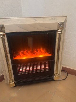 Estufa efecto chimenea cristal y metal