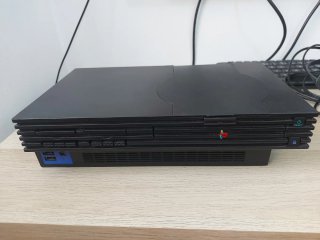 PlayStation 2 + 2 mandos + tarjeta de memoria