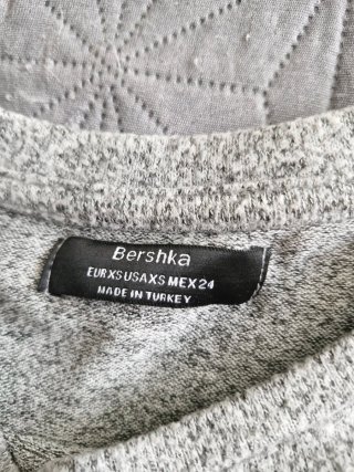 Jersey gris con volantes