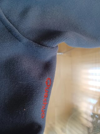 Chaqueta polar Quechua hombre azul y naranja