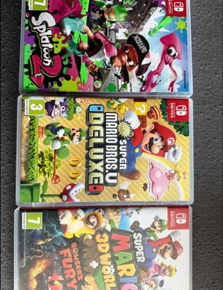 Nintendo Switch Gris/Rojo + Juegos