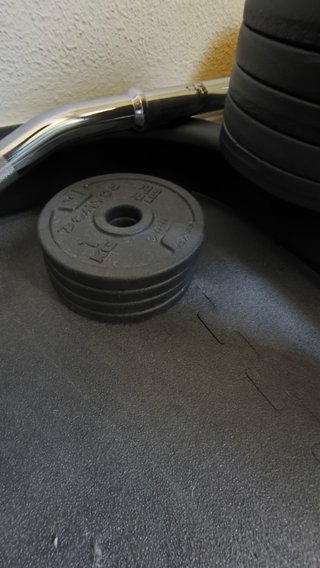 Pack Pesas Domyos 93kg + Barra Z