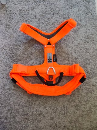 Arnés reflectante naranja para perro