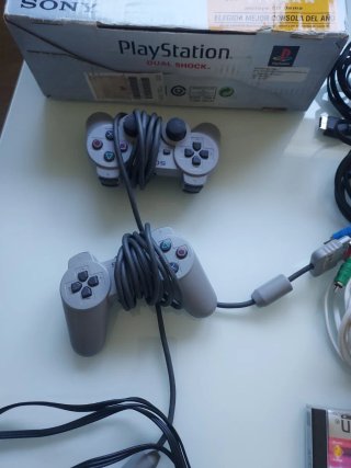 PlayStation 1 Dual Shock gris