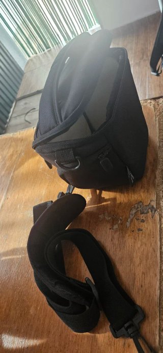 Funda Herschel para cámara de fotos