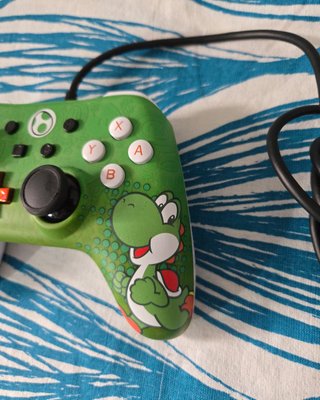 Mando Nintendo Switch Yoshi. Nuevo