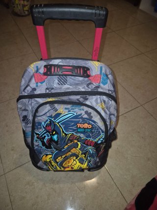 Mochila Totto con ruedas y diseño dragón
