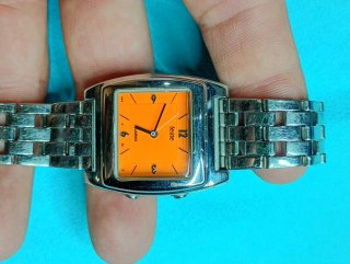 Reloj Casio Felite Naranja y Plateado