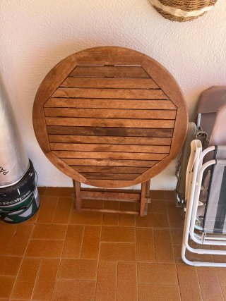 Mesa de exterior plegable de madera de teka
