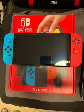 Nintendo Switch OLED Azul/Rojo Como Nueva