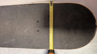 Monopatín Oxelo con herramientas
