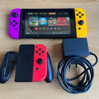 Nintendo Switch Morado/Amarillo con accesorios