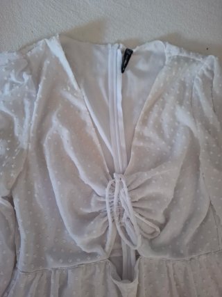 Mono corto blanco con volantes