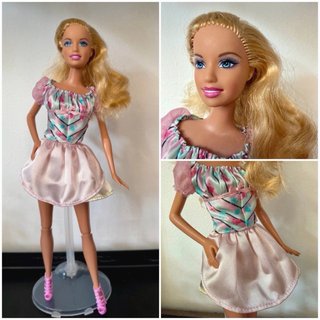 Lote 4 Barbie di vari stili e anni