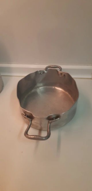 Piezas de cocina antiguas de aluminio