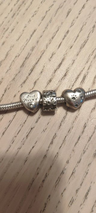 Pulsera Pandora con varios charms230€
