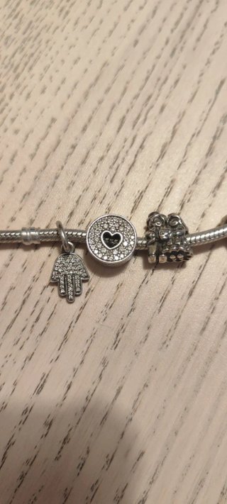 Pulsera Pandora con varios charms230€