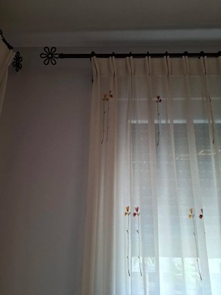 Cortinas salón y barra de forja bronce