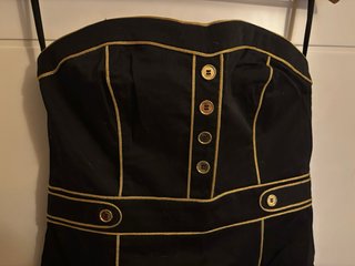 Vestido pin up H&M negro con detalles dorados
