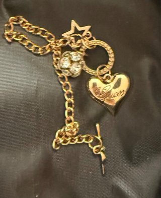 Pulsera Guess Corazón y Estrella Dorada