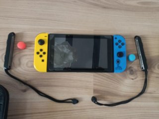 Nintendo Switch Blu/Giallo + Accessori