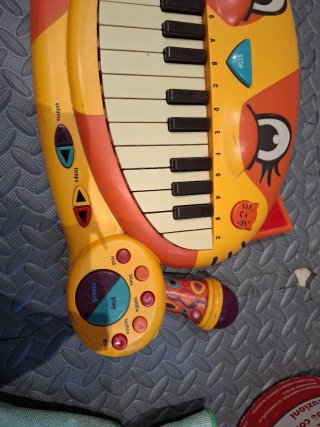 Teclado de juguete infantil con micrófono