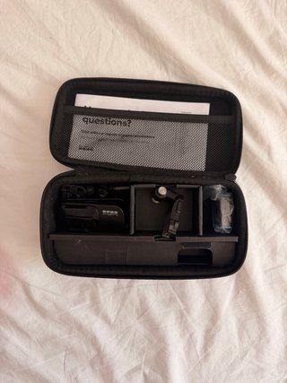Estuche GoPro con accesorios y batería