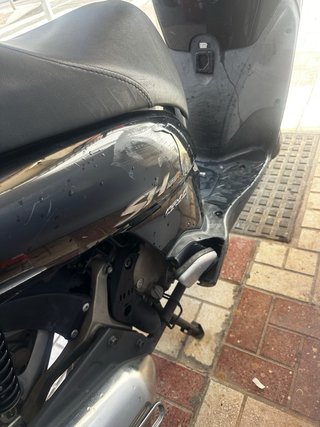Honda SH 125 Scooter Negra y Plateada