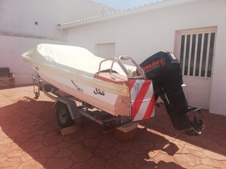 Barco Glastron V-142 con remolque