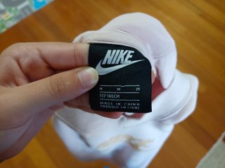 Sudadera Nike rosa y dorada