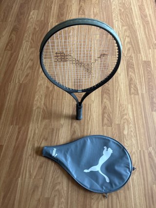 Raqueta de tenis Puma con funda