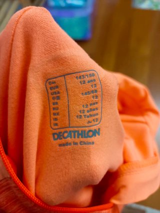 Sudadera deportiva kalenji naranja con capucha