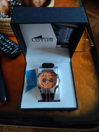 Reloj Lotus Naranja y Plateado
