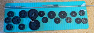 Attrezzatura palestra Domyos 500 + barra 2 m + set manubri