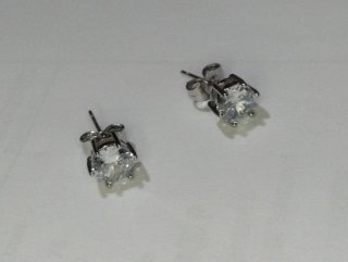 L623 Orecchini punto luce esagonali 7mm inox uomo