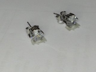 L623 Orecchini punto luce esagonali 7mm inox uomo