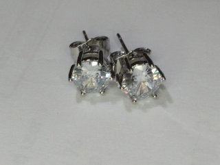 L623 Orecchini punto luce esagonali 7mm inox uomo