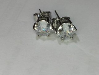 L623 Orecchini punto luce esagonali 7mm inox uomo