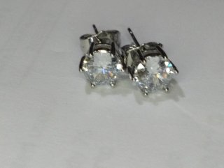 L623 Orecchini punto luce esagonali 7mm inox uomo