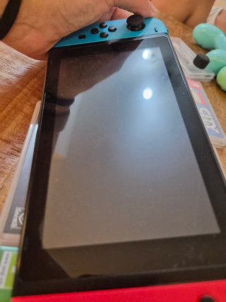 Nintendo Switch + Giochi e Accessori