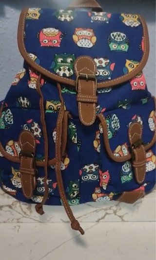 Mochila de tela con estampado de búhos