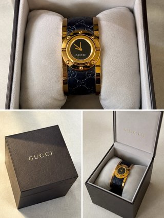 Orologio Gucci dorato e nero con scatola
