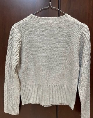 Jersey beige tejido con trenzas