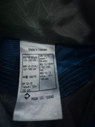 Abrigo infantil Quechua azul y abrigo gris